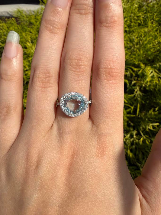 Blue Topaz and Diamond Halo Ring