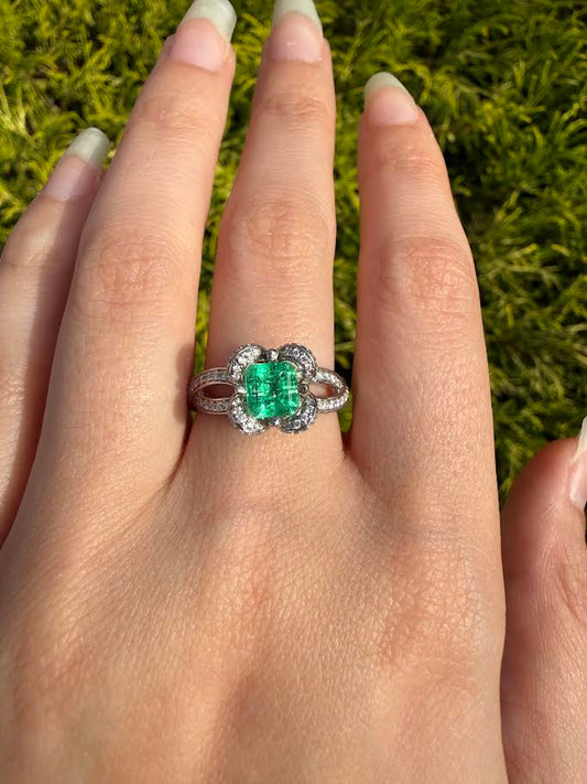 Emerald and Diamond Flower Halo Ring