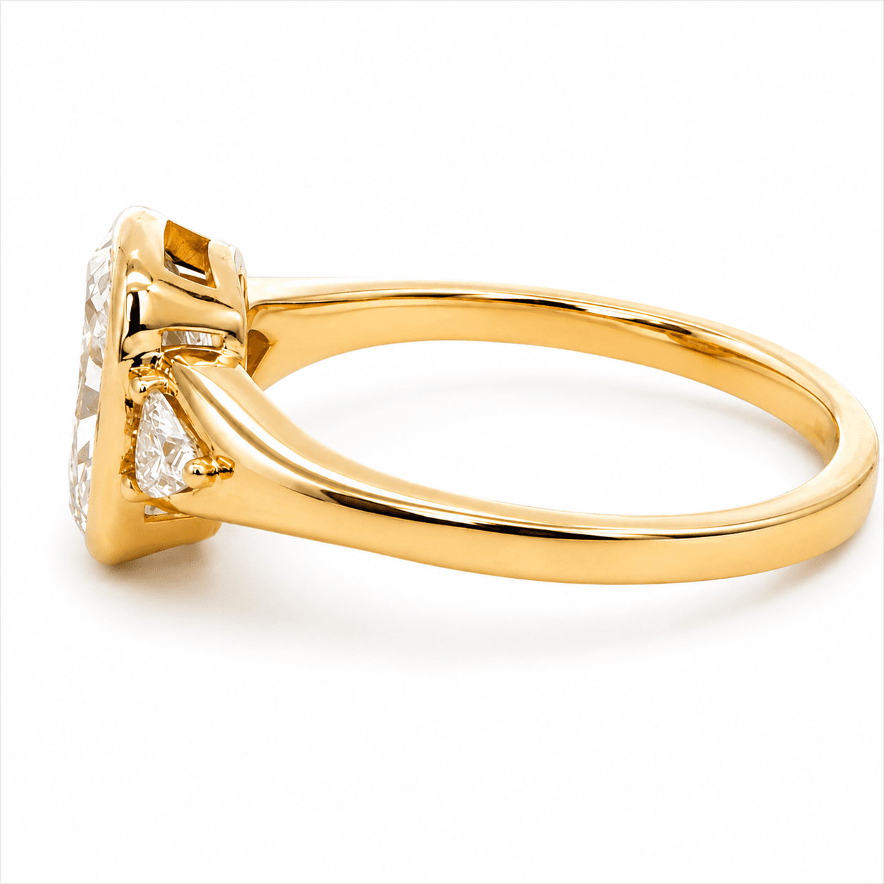 Elongated Cushion Three-Stone Engagement Ring