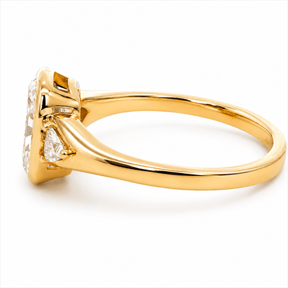 Elongated Cushion Three-Stone Engagement Ring