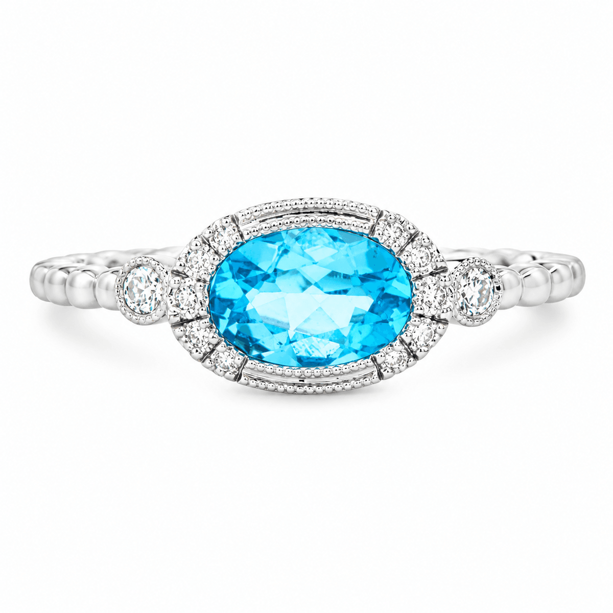 Oval Blue Topaz and Diamond Ring
