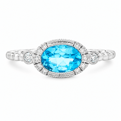 Oval Blue Topaz and Diamond Ring