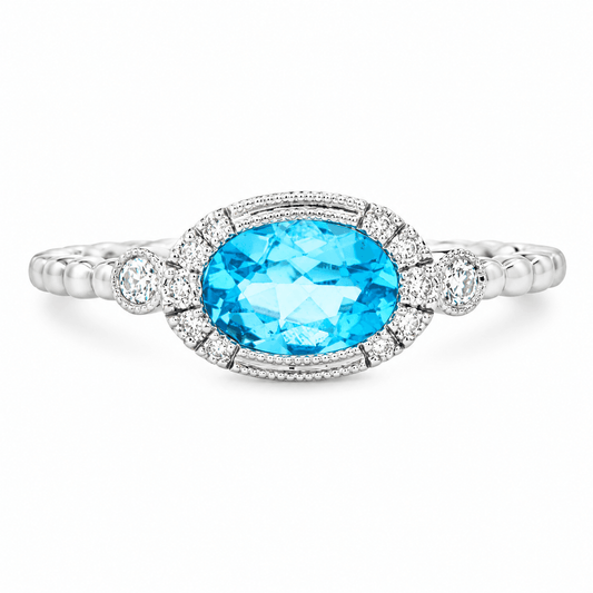 Oval Blue Topaz and Diamond Ring