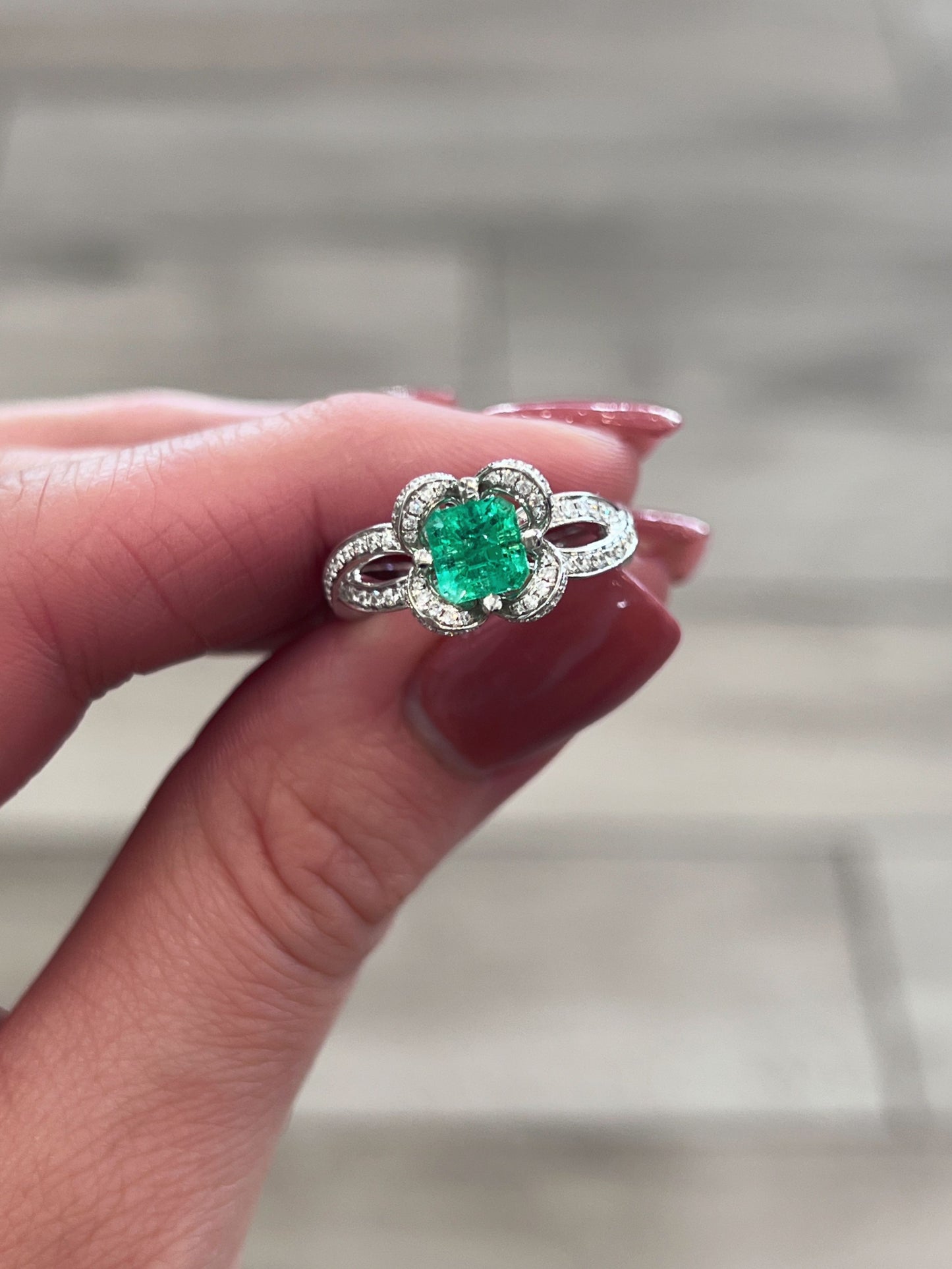 Emerald and Diamond Flower Halo Ring