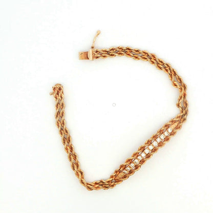 14K YG Braided 0.60 CT TW. Diamond Bar Bracelet