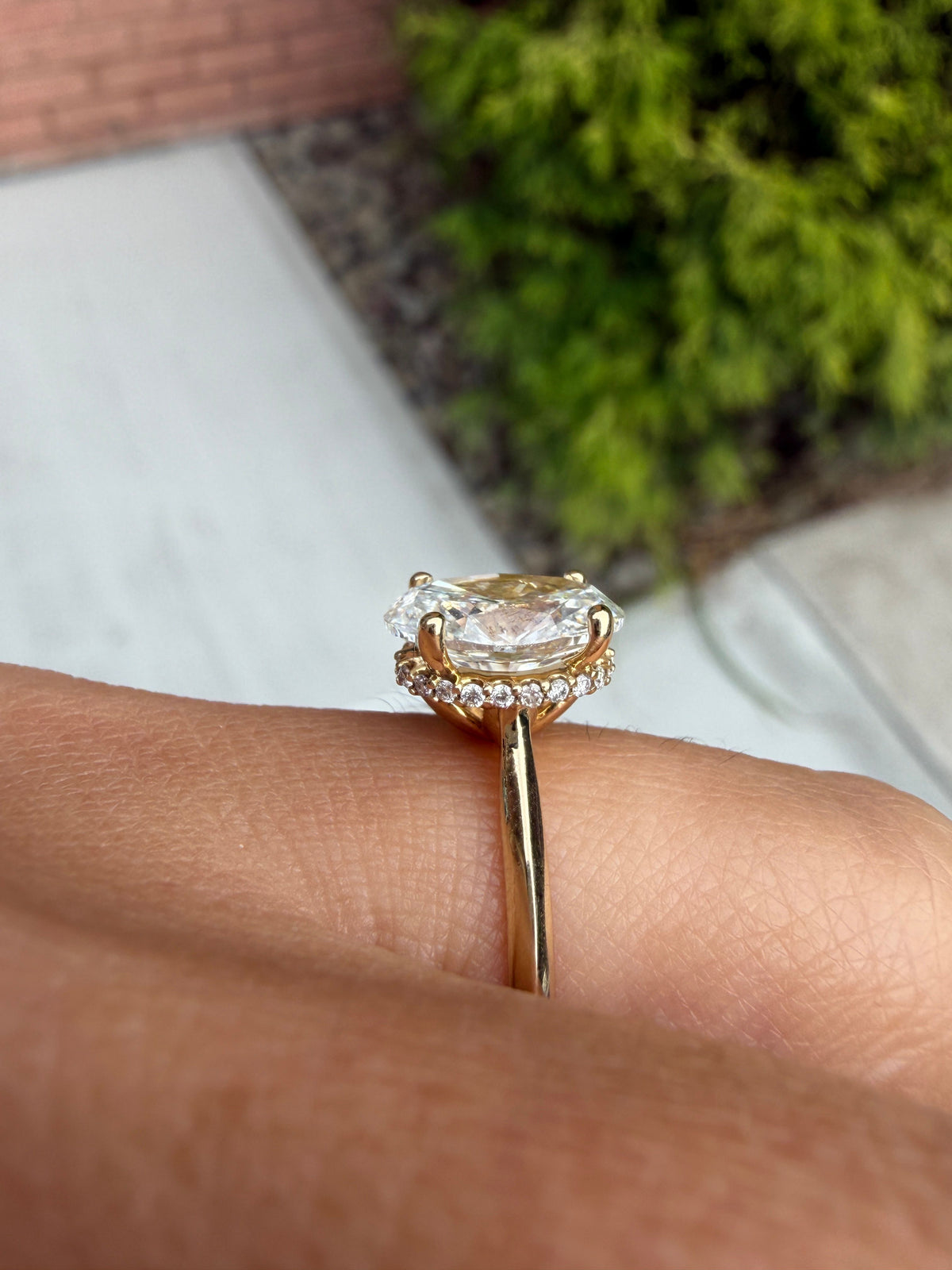 Oval Diamond Solitaire Engagement Ring with Hidden Halo