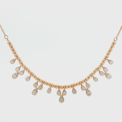 14K YG DIA TEAR DROP BEAD NECK AT 0.85CTTW DIA