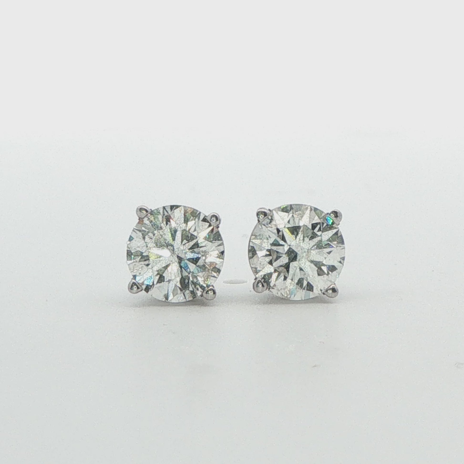 14K WG 1.50CTTW G, I1 DIA STUDS 1 W. GIA CERT # 7432957600