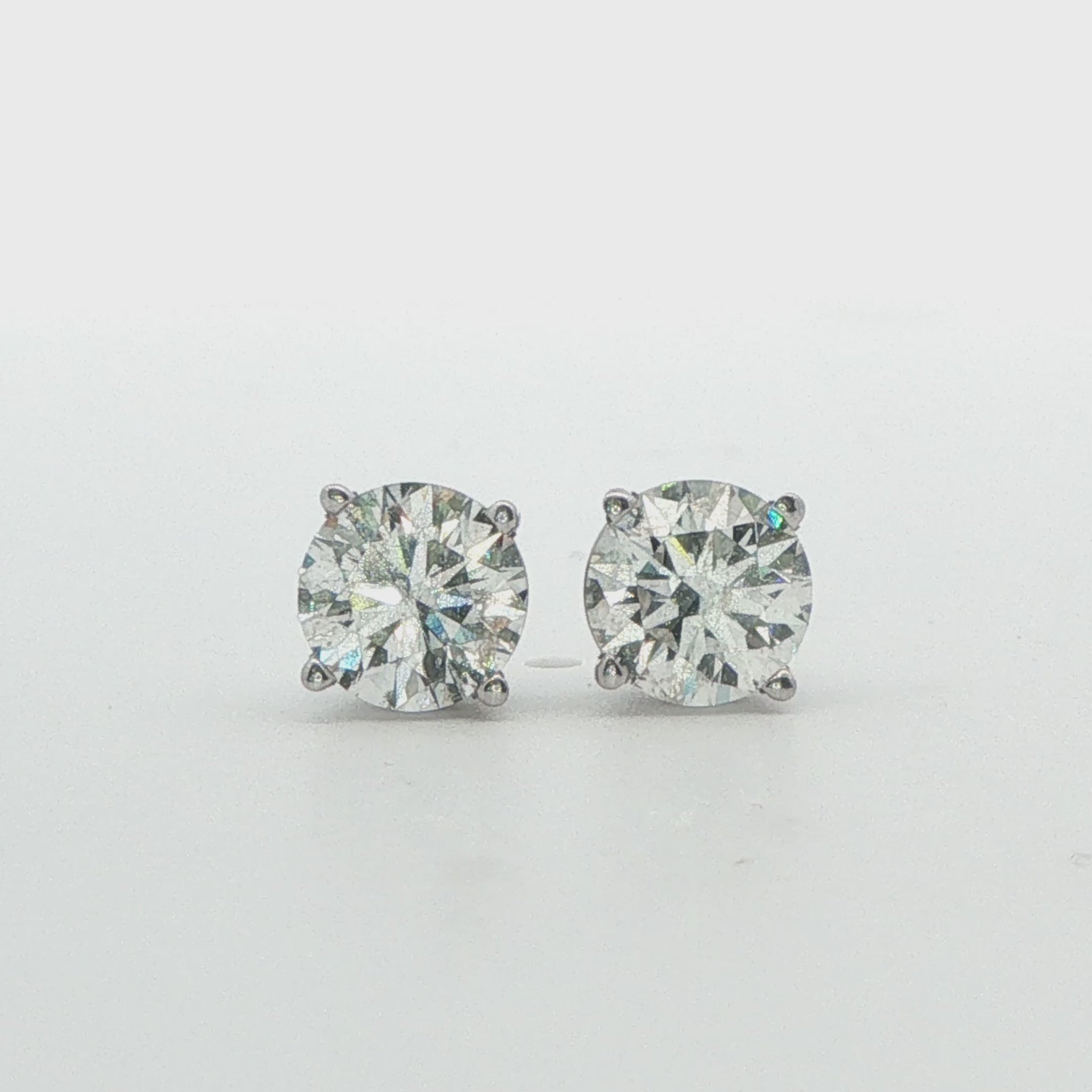 14K WG 1.50CTTW G, I1 DIA STUDS 1 W. GIA CERT # 7432957600