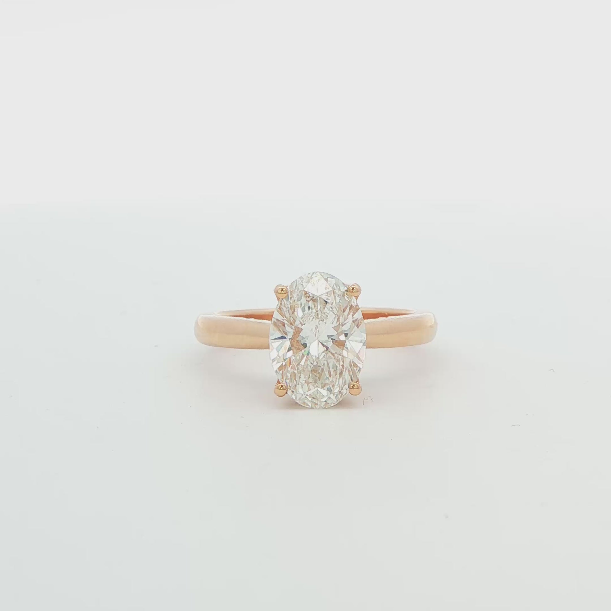 Oval Diamond Solitaire Engagement Ring with Hidden Halo