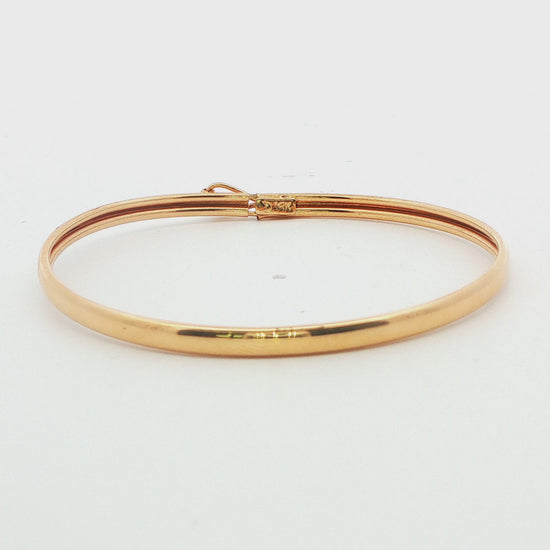 14K YG FIGURE EIGHT BABY BANGLE 1.8G