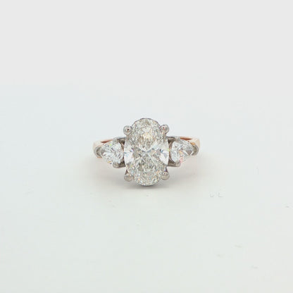 14k YG Oval Dia Engagement Ring with Pear Side Stones and Hidden Halo