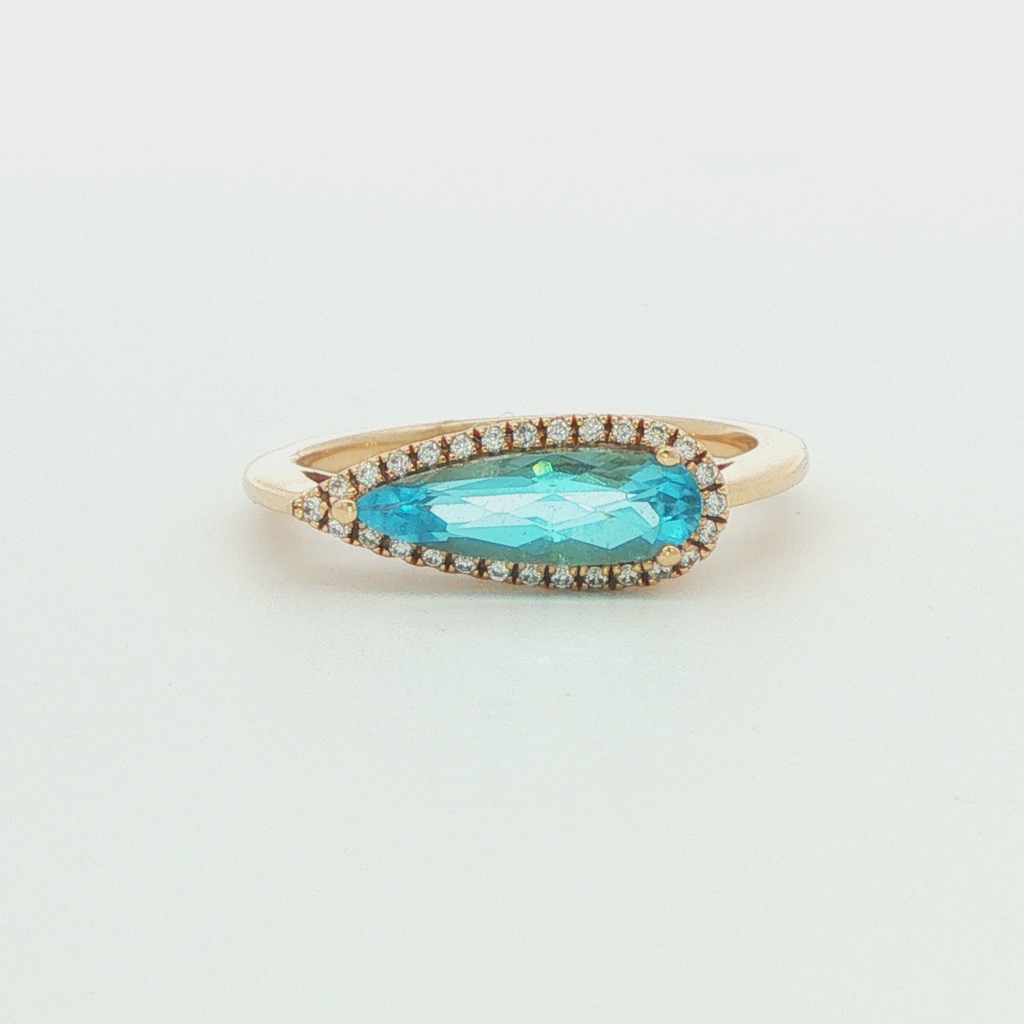 Pear-Shape Topaz Halo Ring