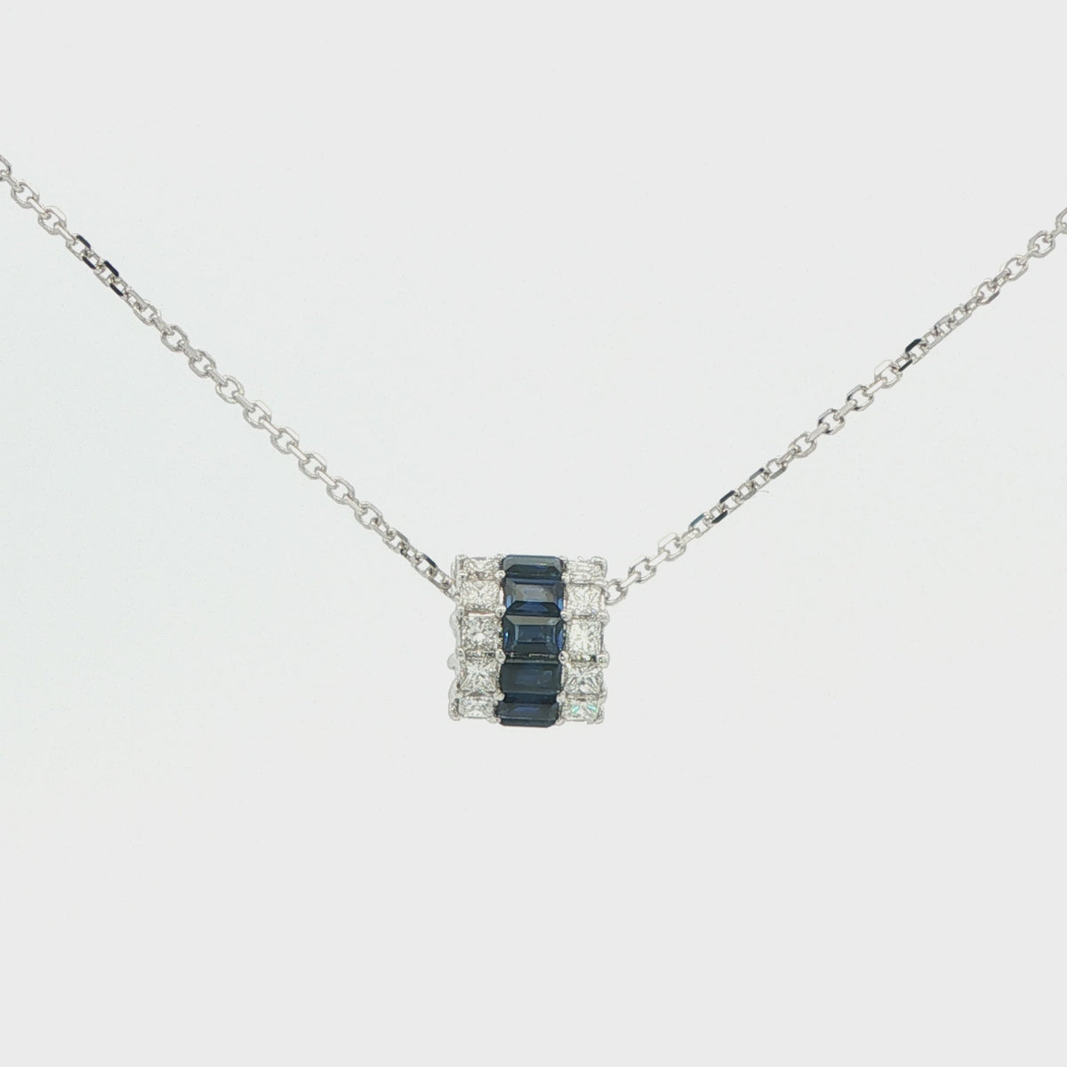 Blue Sapphire and Diamond Rolling Pendant