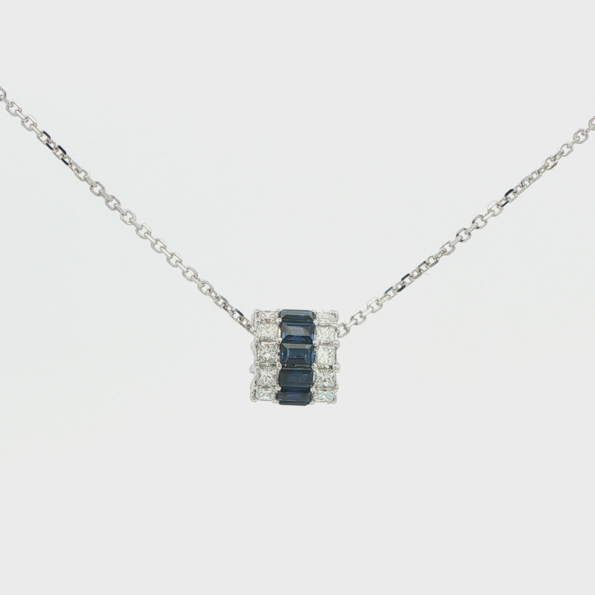 Blue Sapphire and Diamond Rolling Pendant