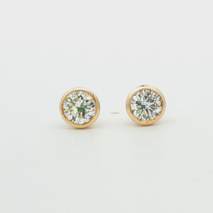 14K YG LG: 1.50 CTW ROUND BEZEL SET DIA STUD EARRINGS