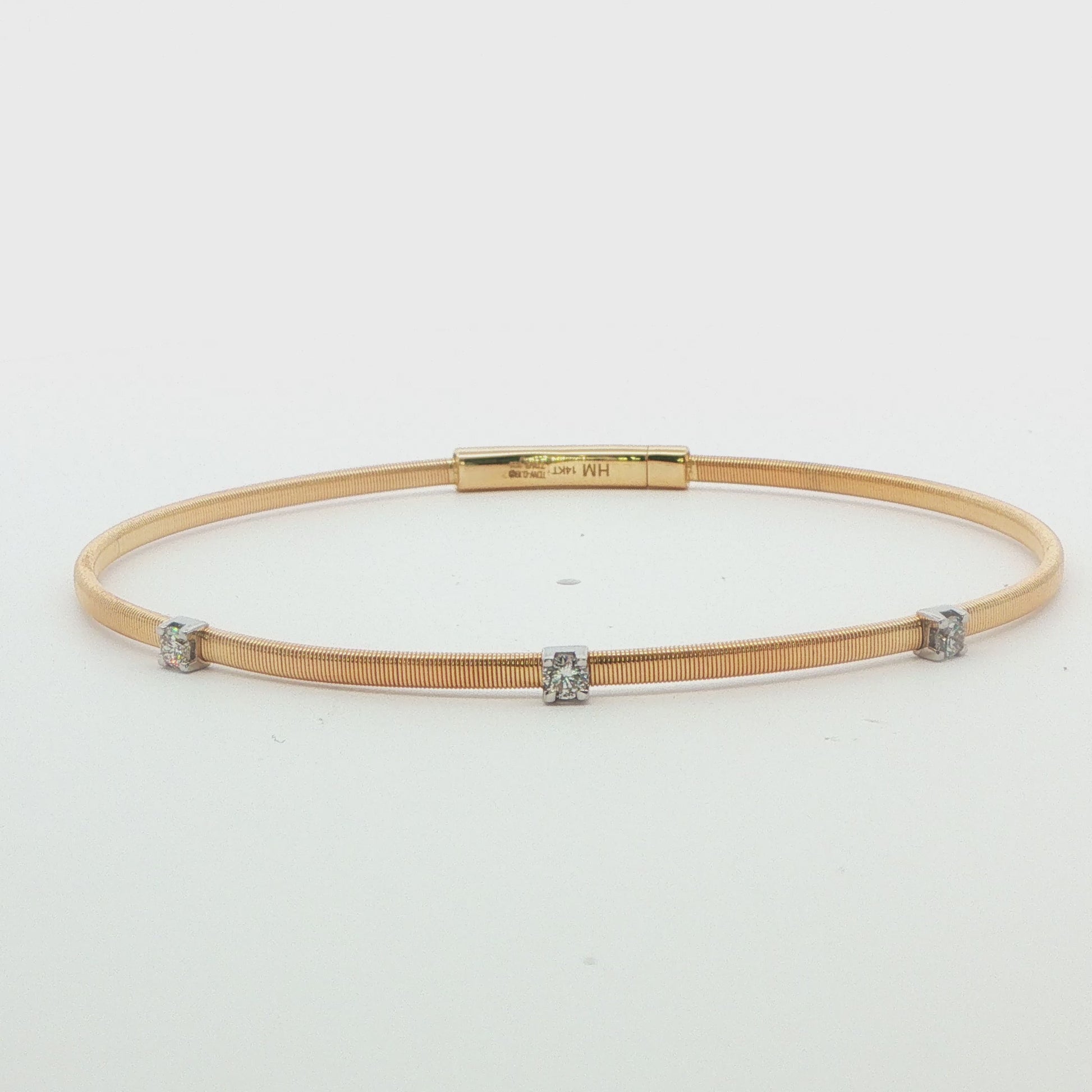 14K YG THREE STONE DIA BANGLE