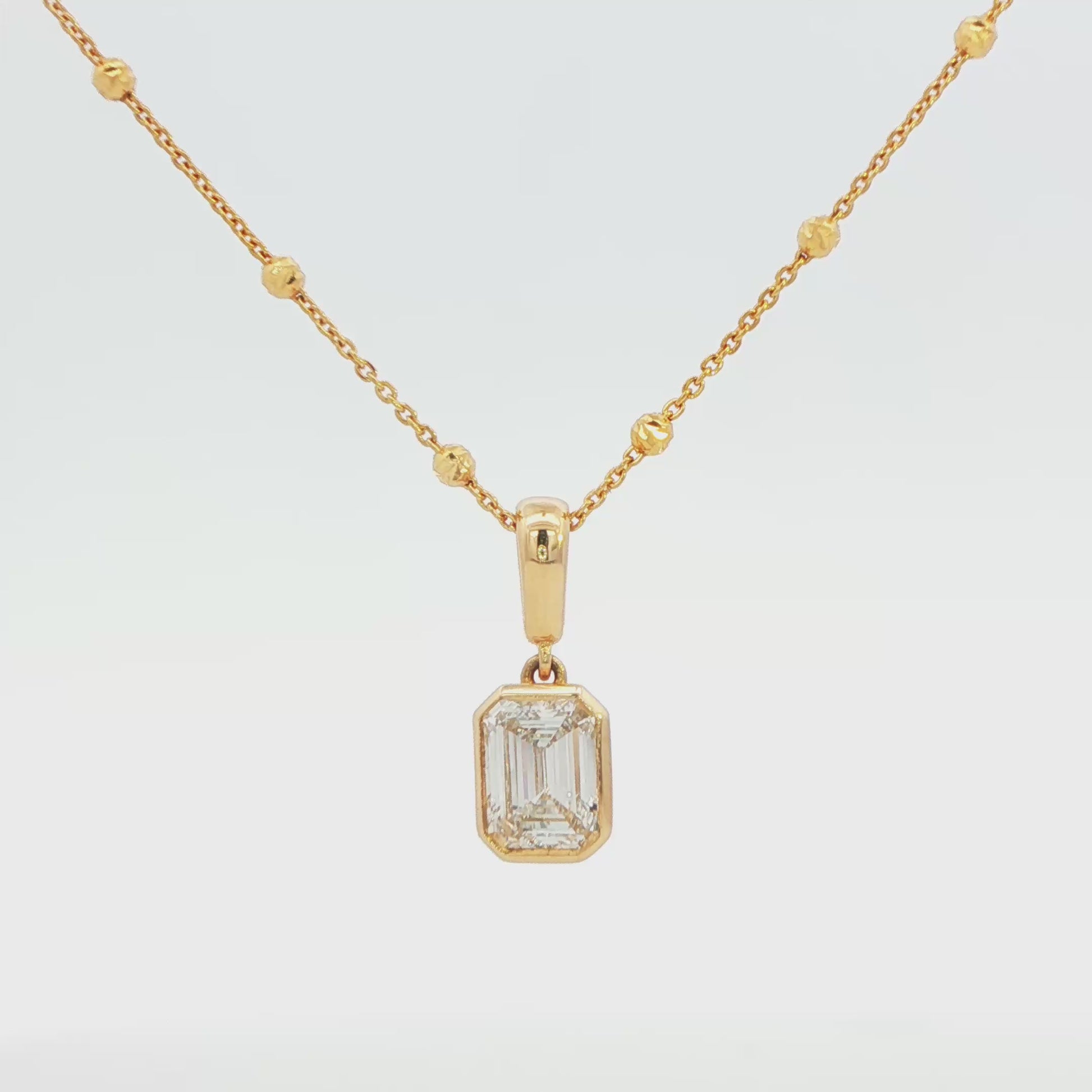 14K YG LG EMERALD CUT DIA 1.00 CTW  BEZEL PNDT