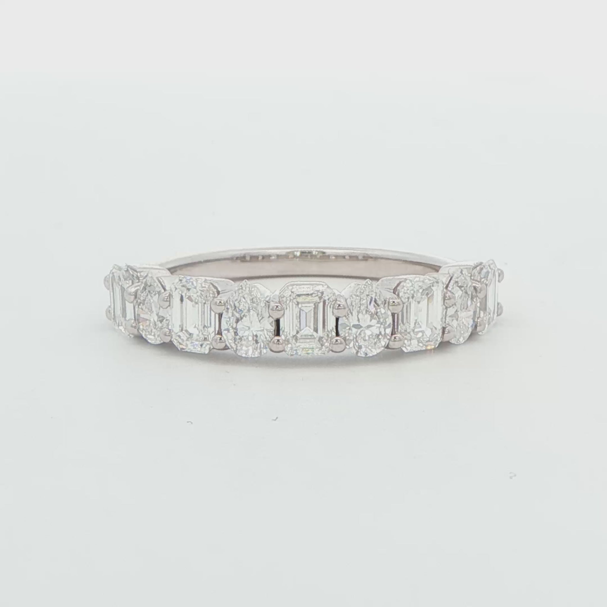 Alternating Emerald and Pear Diamond Wedding Band