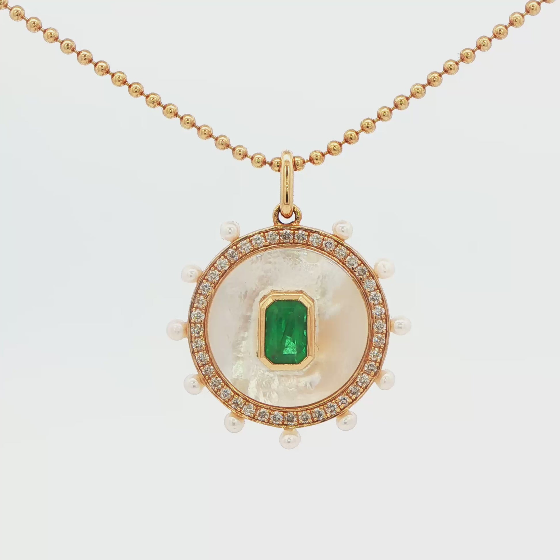 14KYG MOTH OF PEARL EMERALD CTR W\  DIAM AND BABY PEARL ENCIRCULING 1