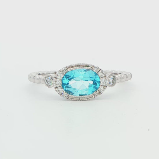 14K WG TOPAZ SEMI OVAL BALL RING