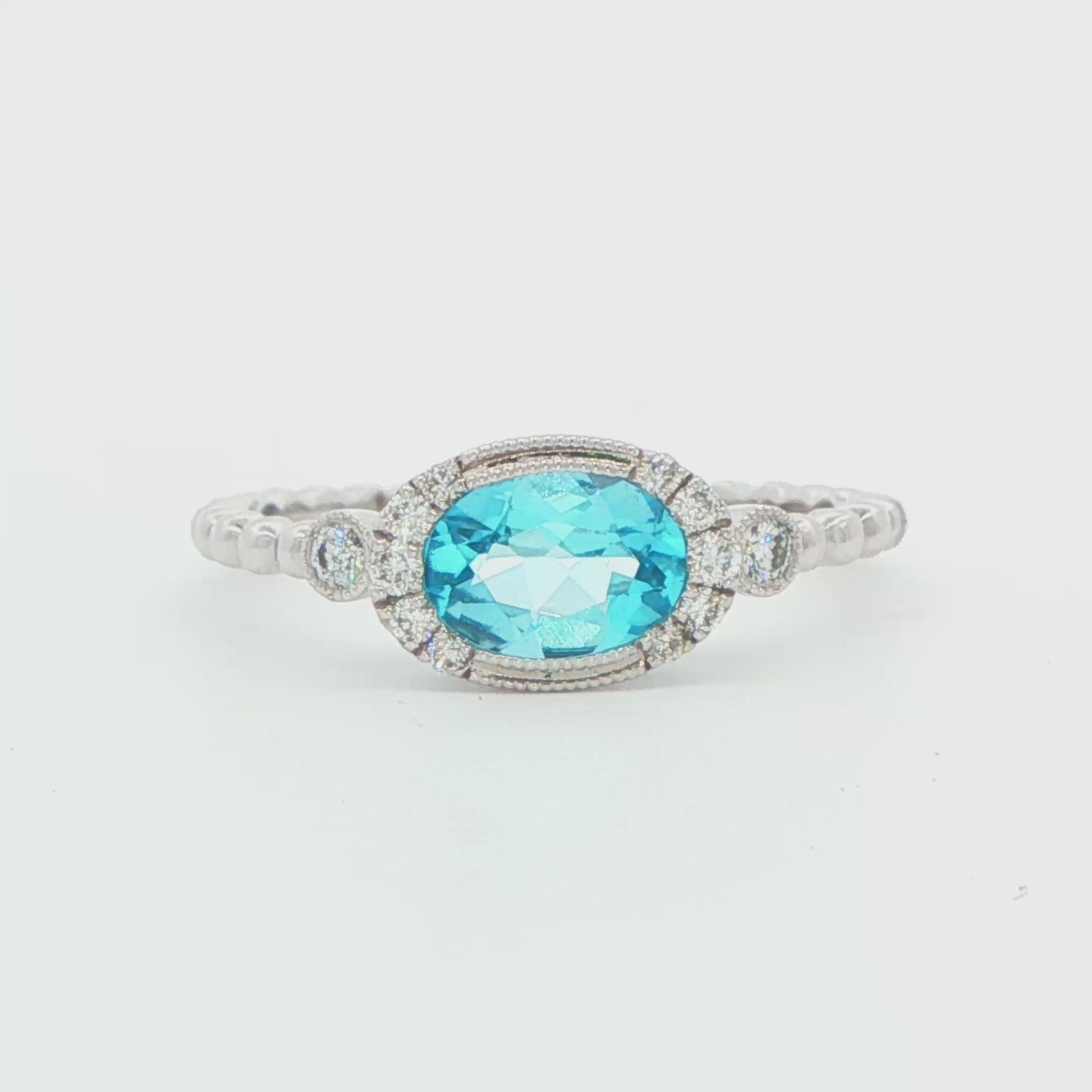 14K WG TOPAZ SEMI OVAL BALL RING