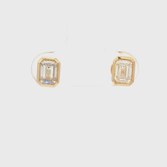 14K YG LG: 1.00CTW EMERALD CUT BEZEL SET STUD EARRINGS
