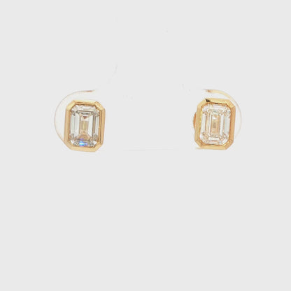 14K YG LG: 1.00CTW EMERALD CUT BEZEL SET STUD EARRINGS