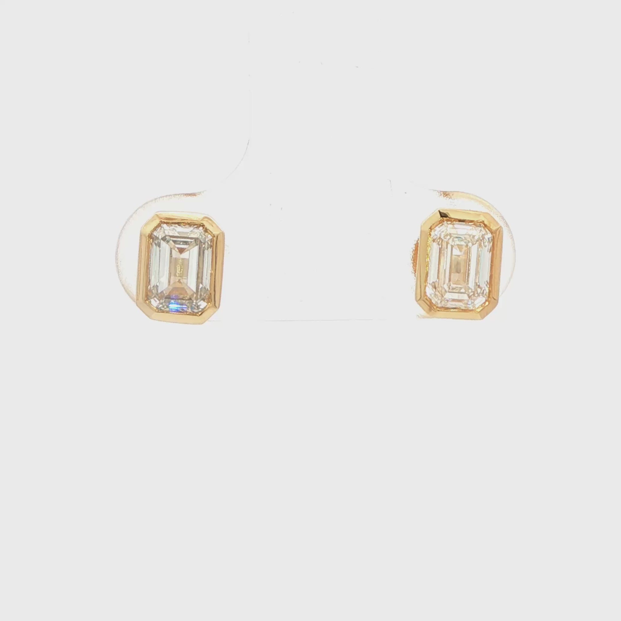 14K YG LG: 1.00CTW EMERALD CUT BEZEL SET STUD EARRINGS