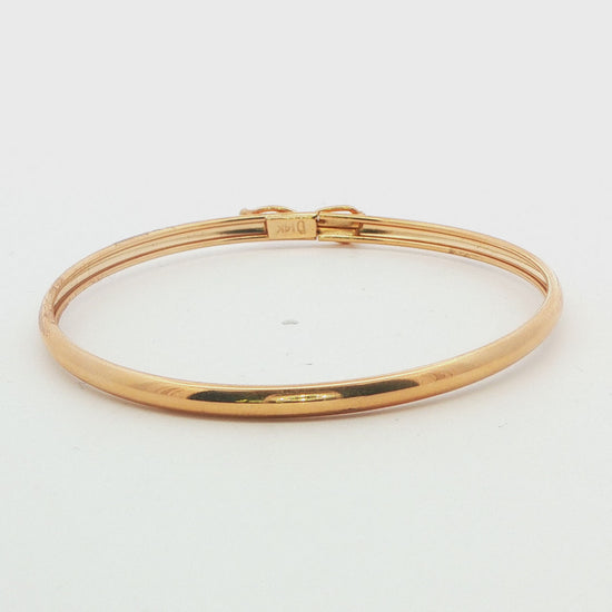 14K YG FIGURE EIGHT BABY BANGLE 2.2G