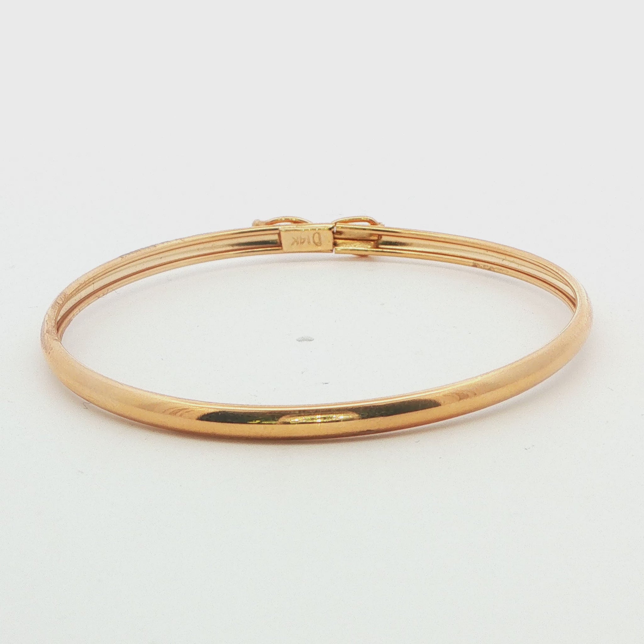 14K YG FIGURE EIGHT BABY BANGLE 2.2G