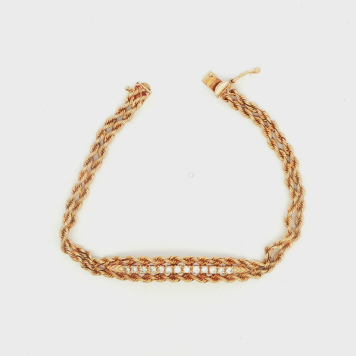 14K YG Braided 0.60 CT TW. Diamond Bar Bracelet