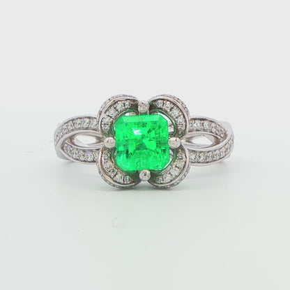 Emerald and Diamond Flower Halo Ring